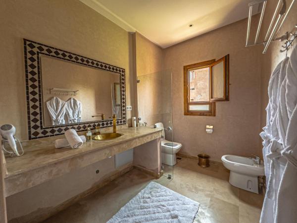 Riad Kenza : photo 10 de la chambre suite lit king-size