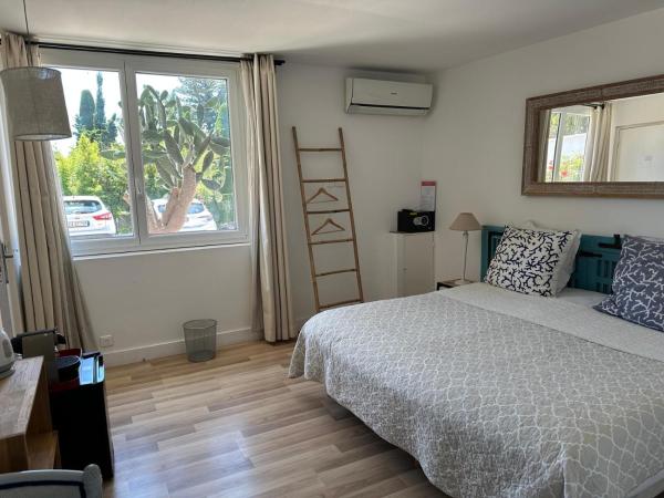 Hôtel La Villa Patricia - Charme et Tradition : photo 2 de la chambre suite lit king-size