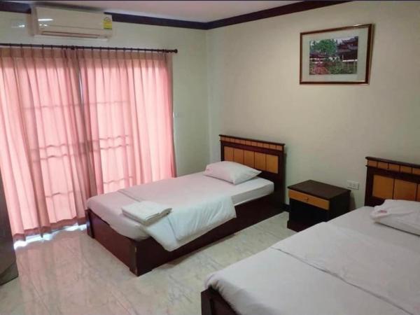Noppakao Place : photo 1 de la chambre chambre lits jumeaux standard