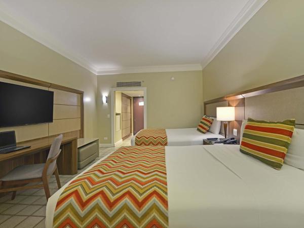 Hotel Deville Prime Salvador : photo 1 de la chambre chambre de luxe avec 2 lits doubles