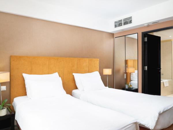 Verdi Budapest Aquincum : photo 4 de la chambre suite supérieure lits jumeaux