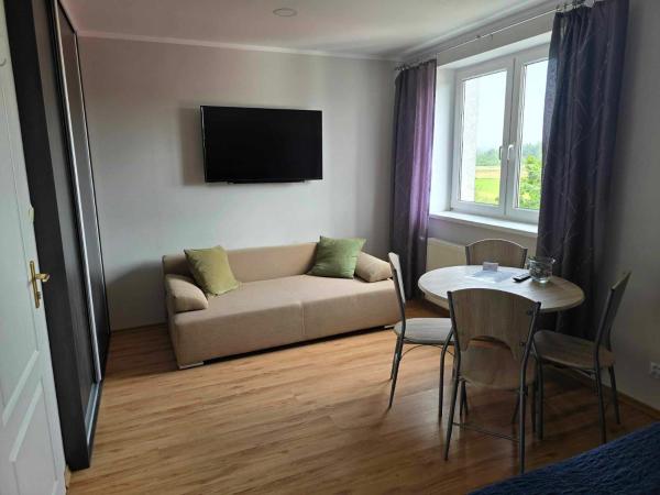 Szafirowy Zakątek : photo 2 de la chambre chambre quadruple avec salle de bains privative