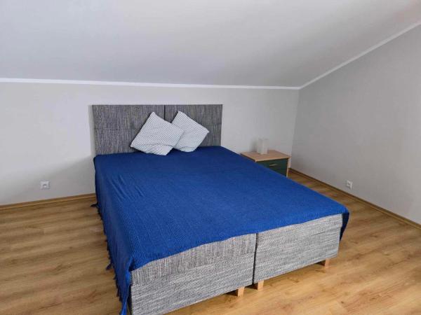 Szafirowy Zakątek : photo 2 de la chambre chambre quadruple avec salle de bains privative