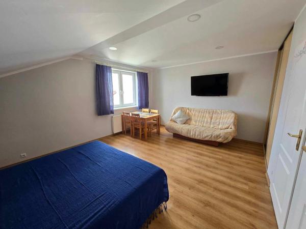 Szafirowy Zakątek : photo 4 de la chambre chambre quadruple avec salle de bains privative