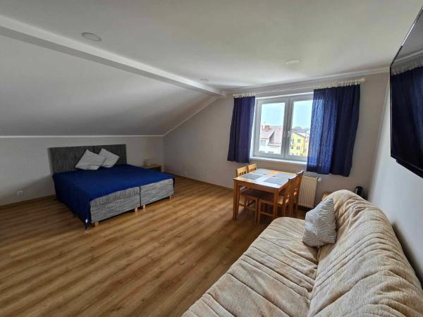 Szafirowy Zakątek : photo 1 de la chambre chambre quadruple avec salle de bains privative