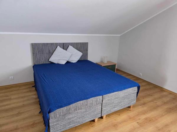 Szafirowy Zakątek : photo 3 de la chambre chambre quadruple avec salle de bains privative