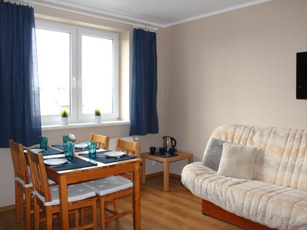 Szafirowy Zakątek : photo 7 de la chambre chambre quadruple avec salle de bains privative