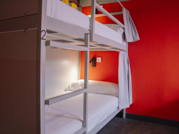 room00 Valencia Hostel : photo 4 de la chambre lit dans dortoir mixte de 9 lits avec salle de bains privative