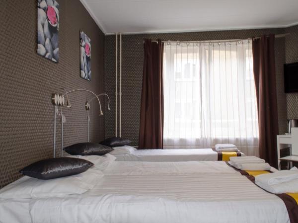 Hotel Flipper Amsterdam : photo 1 de la chambre chambre quadruple avec salle de bains privative