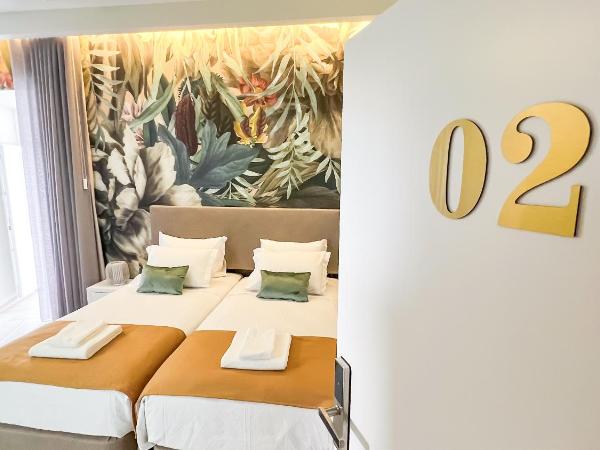 Guest House Jacarandá Faro : photo 10 de la chambre chambre lits jumeaux