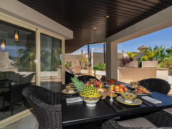 Molo Residences Boutique Apartments & Spa : photo 7 de la chambre appartement 2 chambres - vue sur jardin