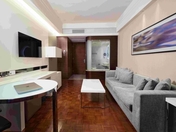 Nina Hotel Island South : photo 2 de la chambre suite lit king-size - vue sur ville