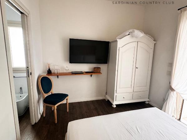 Su Entu Sardinian Country Club : photo 1 de la chambre chambre deluxe - vue sur piscine
