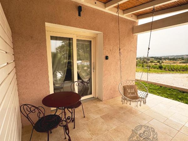 Su Entu Sardinian Country Club : photo 10 de la chambre chambre deluxe - vue sur jardin