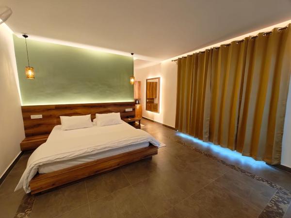 Malgudi Farms : photo 4 de la chambre chambre double deluxe avec balcon