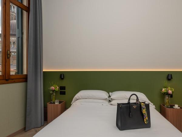 Hotel Casa Del Pellegrino : photo 10 de la chambre chambre triple confort avec vue