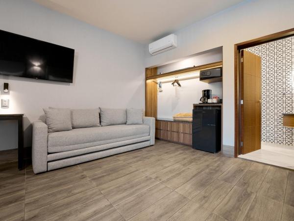 Hotel Estancia Business Class : photo 7 de la chambre suite familiale