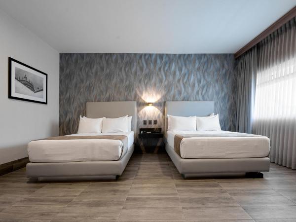 Hotel Estancia Business Class : photo 3 de la chambre suite junior