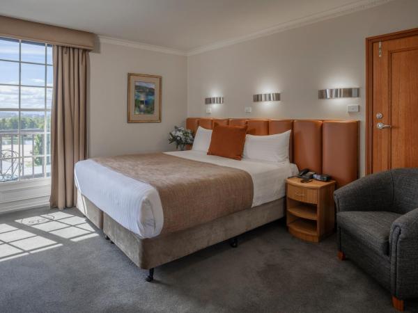 Country Club Tasmania : photo 1 de la chambre chambre lit king-size - vue sur jardin