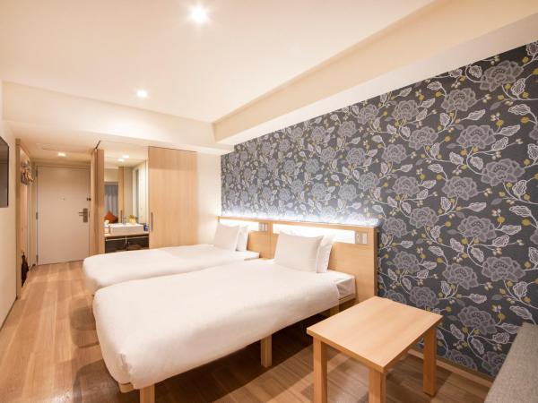 karaksa hotel TOKYO STATION : photo 1 de la chambre chambre lits jumeaux standard avec canapé-lit