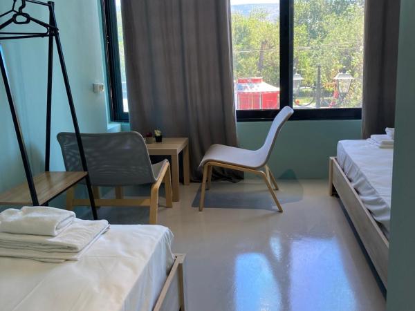 26 Amalias : photo 2 de la chambre chambre lits jumeaux standard avec salle de bains commune