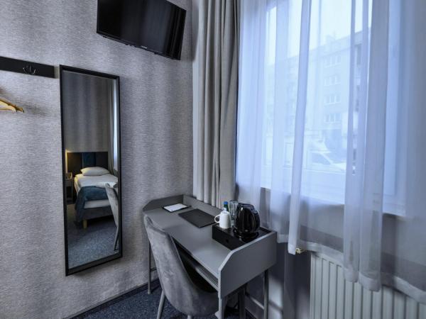 Elegant Apartments : photo 7 de la chambre chambre simple avec salle de bains