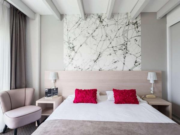 Brit Hôtel De L'océan : photo 9 de la chambre hébergement familial en duplex - vue sur ville