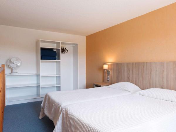 Brit Hôtel De L'océan : photo 5 de la chambre hébergement familial en duplex - vue sur ville