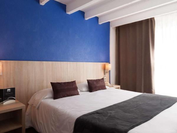 Brit Hôtel De L'océan : photo 2 de la chambre hébergement familial en duplex - vue sur ville