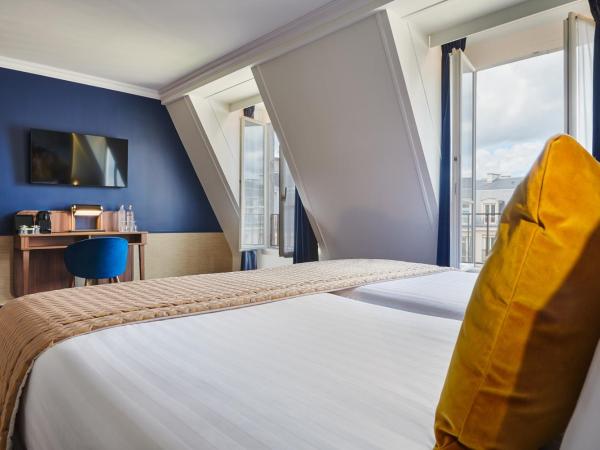 Hôtel Le Versailles : photo 5 de la chambre chambre double ou lits jumeaux supérieure