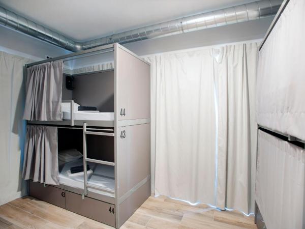 Hostel Dos Estaciones : photo 4 de la chambre lit superposé dans dortoir mixte (16 adultes)