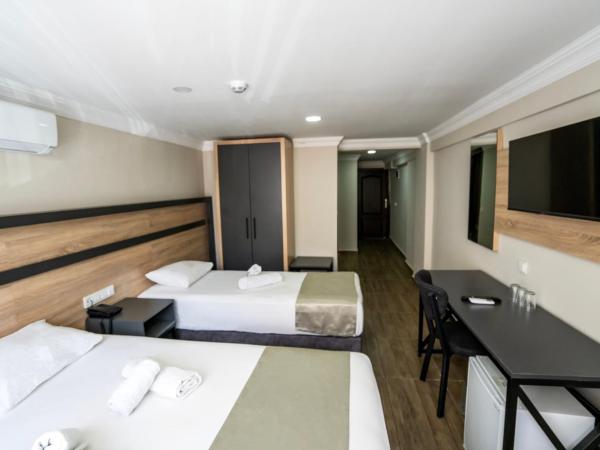 Marka Hotel : photo 2 de la chambre chambre triple de luxe