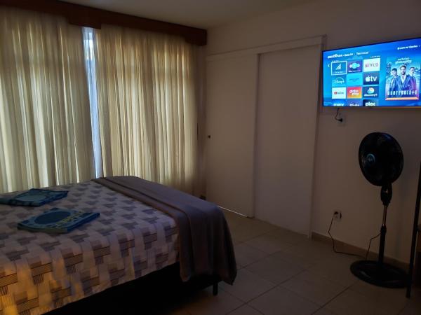 Pousada Monte Gerizim : photo 2 de la chambre chambre lit queen-size deluxe