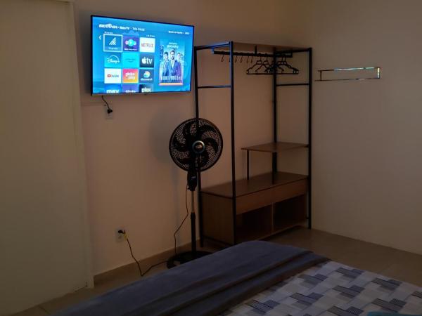 Pousada Monte Gerizim : photo 7 de la chambre chambre lit queen-size deluxe