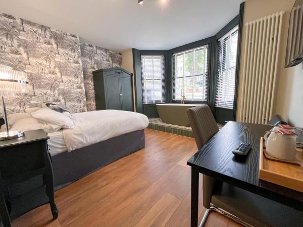 INNit Bliss : photo 2 de la chambre chambre double deluxe avec baignoire