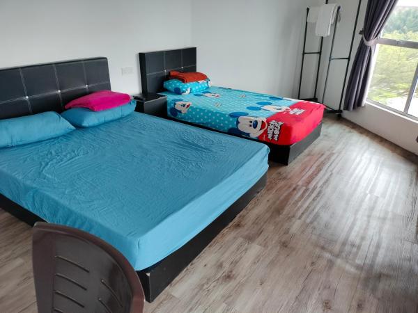 BENUTHOMESTAY : photo 1 de la chambre chambre triple basique avec salle de bains commune