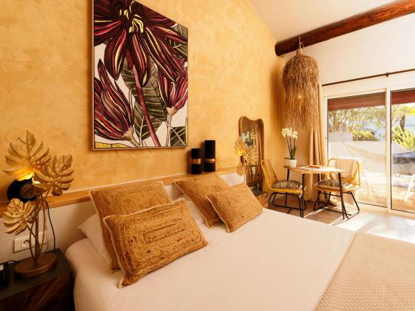 Hôtel L' Estelle en Camargue : photo 1 de la chambre chambre quadruple