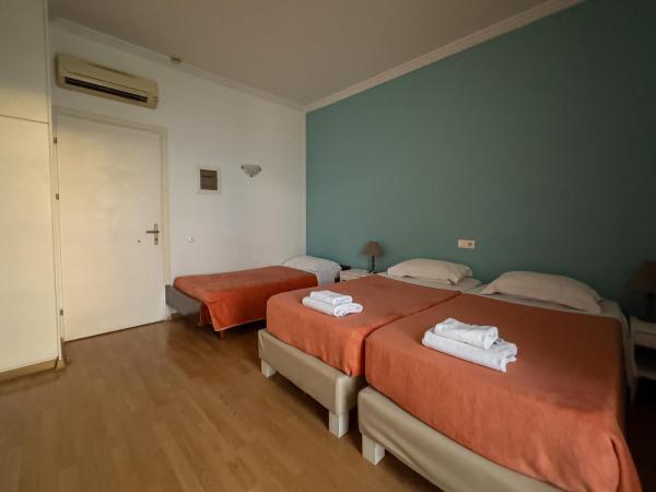 City Marina : photo 8 de la chambre chambre triple supérieure avec lit d'appoint