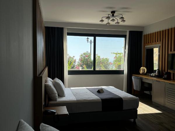 The Rest Port Argento : photo 1 de la chambre chambre familiale - vue sur mer