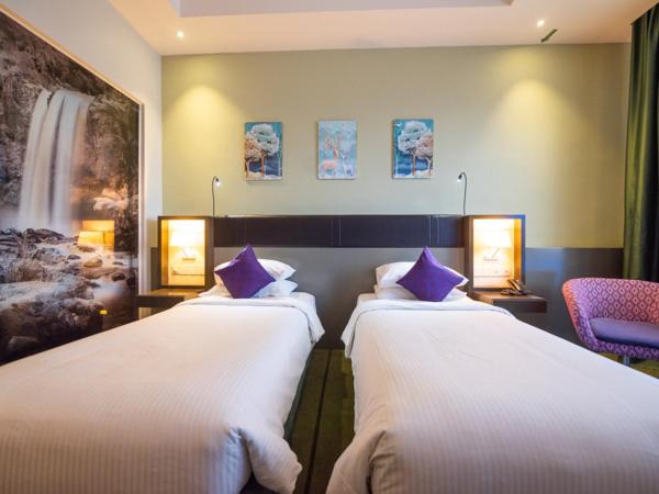 Asaya Hotel Kota Kinabalu - Refurbished 2024 : photo 1 de la chambre chambre lits jumeaux deluxe