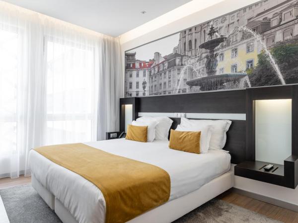 Jupiter Lisboa Hotel : photo 1 de la chambre chambre double ou lits jumeaux standard