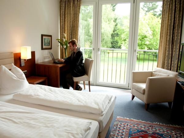 Hotel Alhartinger Hof : photo 1 de la chambre appartement - vue sur jardin