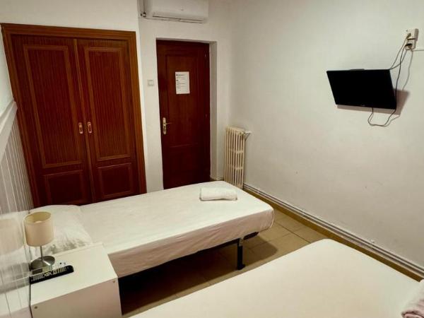 Metropolitan Atocha : photo 5 de la chambre chambre lits jumeaux avec salle de bains commune