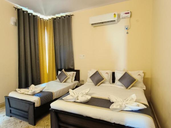 Neighbour Inn - Apart Hotel : photo 3 de la chambre chambre triple deluxe