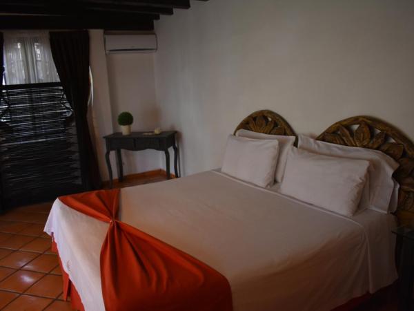 La Joyita Cuernavaca : photo 4 de la chambre chambre lit king-size deluxe