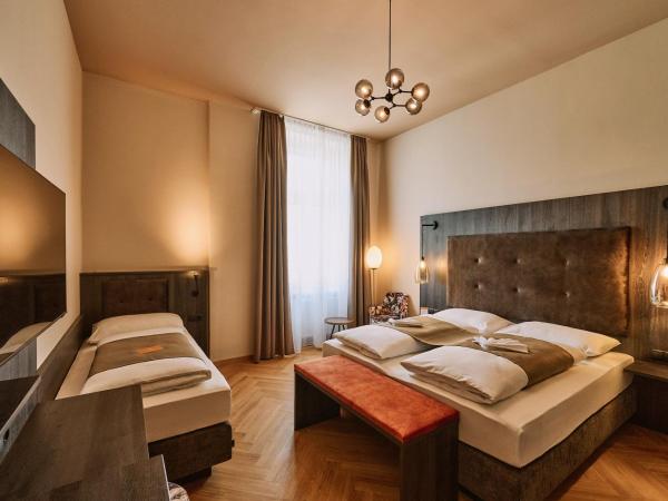 Urban Rooms Rathaus - Self Check-In : photo 1 de la chambre chambre triple supérieure