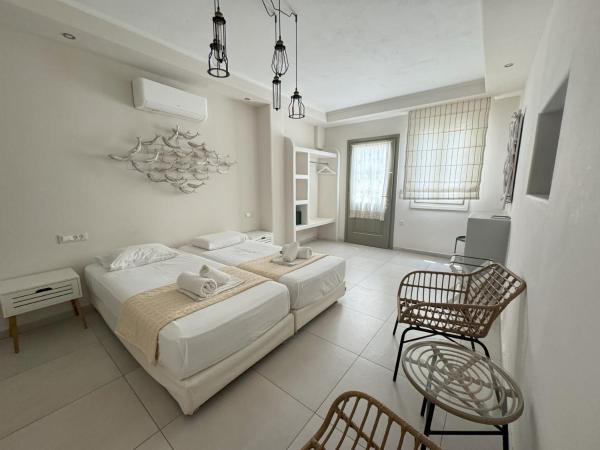 Anassa Suites : photo 1 de la chambre chambre double ou lits jumeaux - rez-de-chaussée