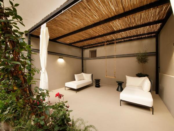 ISONZO SUITES : photo 3 de la chambre chambre lit king-size avec baignoire spa