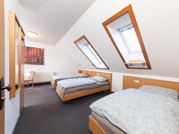 Pension Greiser : photo 1 de la chambre chambre triple