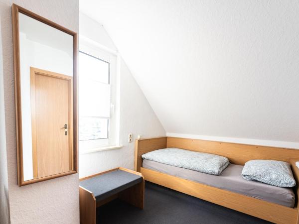 Pension Greiser : photo 1 de la chambre chambre triple